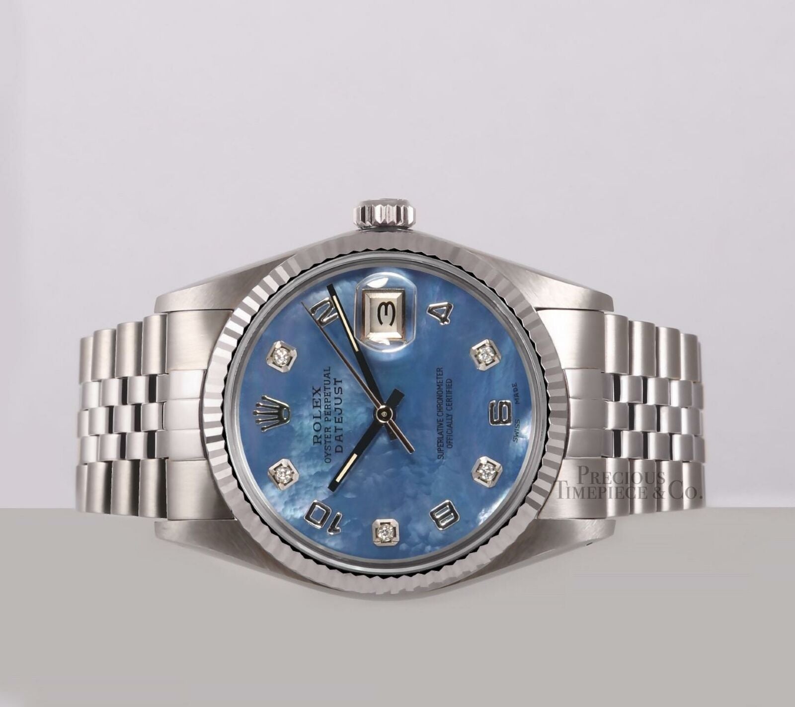 Rolex Mens Datejust Steel 36mm-18k Fluted Bezel-Blue MOP Arab Diamond Dial